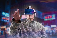 Military in VR headset touching virtual screen for simulation training military technology