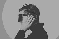 Man touching smart headphones to communicate futuristic technology