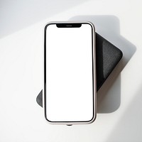 Smartphone with blank screen on innovative wireless charger
