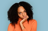 Bored woman with chin resting on her palm