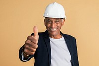 Mixed Indian engineer doing a thumbs up hand gesture 