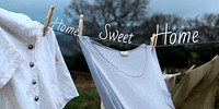 Clothesline aesthetic Twitter post template, home sweet home quote vector