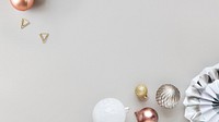 Festive baubles on a gray background 