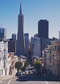 View down a street in downtown San Francisco near the Transamerica Pyramid skyscraper. Original public domain image from Wikimedia Commons