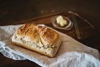 Freshly baked loaf of bread with butter. Original public domain image from <a href="https://commons.wikimedia.org/wiki/File:Fresh_Bread_and_Butter_(Unsplash).jpg" target="_blank" rel="noopener noreferrer nofollow">Wikimedia Commons</a>