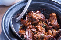 Stewed meat in a bowl with a spoon in Klang. Original public domain image from Wikimedia Commons