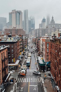 Aerial view of morning traffic and skyscrapers in on foggy New York day. Original public domain image from <a href="https://commons.wikimedia.org/wiki/File:NYC_Winter_(Unsplash).jpg" target="_blank" rel="noopener noreferrer nofollow">Wikimedia Commons</a>