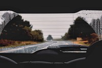 View from the backseat of a car through a wet rear window. Original public domain image from <a href="https://commons.wikimedia.org/wiki/File:Rear_view_(Unsplash).jpg" target="_blank">Wikimedia Commons</a>