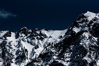 Snow covered mountain against a dark blue sky in Ouray, Colorado. Original public domain image from <a href="https://commons.wikimedia.org/wiki/File:Mountain_with_snow_near_dark_skies_(Unsplash).jpg" target="_blank" rel="noopener noreferrer nofollow">Wikimedia Commons</a>