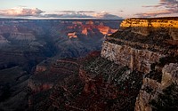 Sun rises over a beautiful Grand Canyon landscape. Original public domain image from Wikimedia Commons