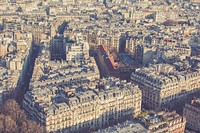 A drone shot of Paris buildings with sepia tone. Original public domain image from Wikimedia Commons