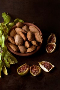 Bowl of almonds by figs and fennel. Original public domain image from Wikimedia Commons