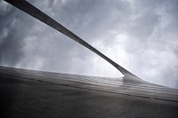 An angular shot of a part of the Gateway Arch in St. Louis, Missouri. Original public domain image from <a href="https://commons.wikimedia.org/wiki/File:Arch_in_the_sky_(Unsplash).jpg" target="_blank" rel="noopener noreferrer nofollow">Wikimedia Commons</a>
