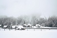 Fog over snow covered cabins near a forest in Finkenberg. Original public domain image from <a href="https://commons.wikimedia.org/wiki/File:Foggy_day_at_Finkenberg_(Unsplash).jpg" target="_blank" rel="noopener noreferrer nofollow">Wikimedia Commons</a>