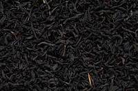 Blackened tea leaves close up. Original public domain image from Wikimedia Commons