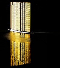 The reflection of a brightly lit wall on the water surface at Fiera Milano Rho P5.. Original public domain image from <a href="https://commons.wikimedia.org/wiki/File:Golden_reflection_(Unsplash).jpg" target="_blank" rel="noopener noreferrer nofollow">Wikimedia Commons</a>