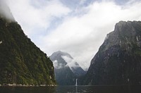 Three moutains and lake view in Milford Sound, New Zealand. Original public domain image from <a href="https://commons.wikimedia.org/wiki/File:Milford_Sound,_New_Zealand_(Unsplash_asWzldTOX4I).jpg" target="_blank">Wikimedia Commons</a>