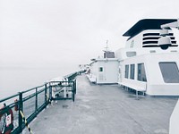 A desaturated photo of a ferry vessel's deck.. Original public domain image from <a href="https://commons.wikimedia.org/wiki/File:Ferry_deck_(Unsplash).jpg" target="_blank" rel="noopener noreferrer nofollow">Wikimedia Commons</a>