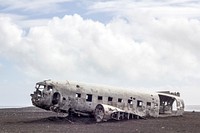 Abandoned airplane wreckage in the desert of Solheimasandur. Original public domain image from Wikimedia Commons
