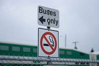 City signs reading "buses only" and "no smoking". Original public domain image from <a href="https://commons.wikimedia.org/wiki/File:No_Smoking_here,_no_smoking_there-_(Unsplash).jpg" target="_blank" rel="noopener noreferrer nofollow">Wikimedia Commons</a>