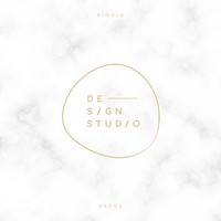 Simple design studio badge on a marble background