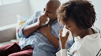 Couple coughing and sneezing during coronavirus pandemic
