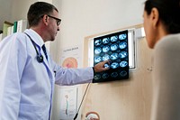 Doctor explaining the X-ray results to a patient