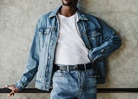 Black man wearing a silk screen white t-shirt