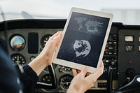 Aviator using a digital tablet for navigation