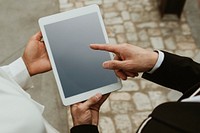 Businesspeople using a digital tablet