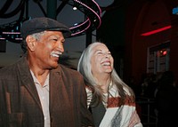 Cheerful elderly couple at Pacific Park in Santa Monica, California