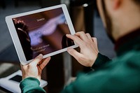 Man using a digital tablet screen