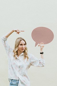 Woman showing a blank speech bubble