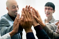 Cheerful business people doing a high five