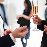 Businessman handing over a business card