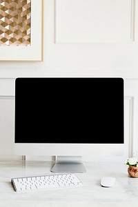 Computer screen in a minimal design office