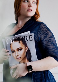 Woman holding a magazine