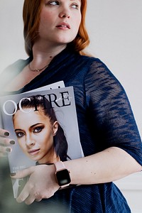 Woman holding a magazine