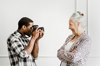 Male photographer and senior female client