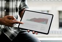 Black man display a digital tablet