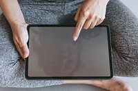 Yoga instructor using a digital tablet mobile phone wallpaper