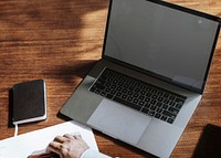 Businessman using a laptop screen