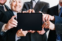 Business people presenting a tablet