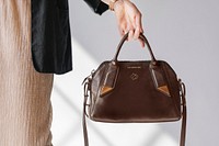 Woman carrying a shoulder bag mockup