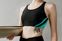 Sportive woman with a yoga mat mockup