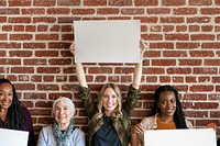 Diverse women showing blank posters template