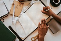 Woman writing on a notebook