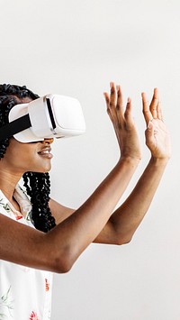 Black woman enjoying a VR headset mobile phone wallpaper
