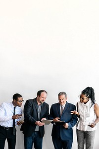 Group of businesspeople using digital devices