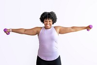 Happy African American woman exercising